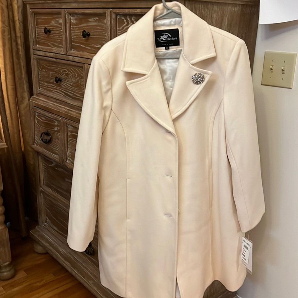 Cream color vintage coat.